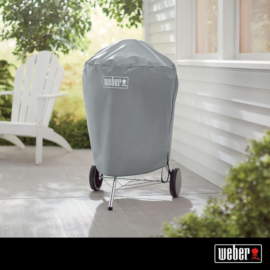 Weber Classic Kettle barbecue au charbon de bois, surface de cuisson Ø 57cm, barbecue avec couvercle et cuve en acier emaillé, thermomètre intégré au couvercle, trépied et roues - Noir (1341504)